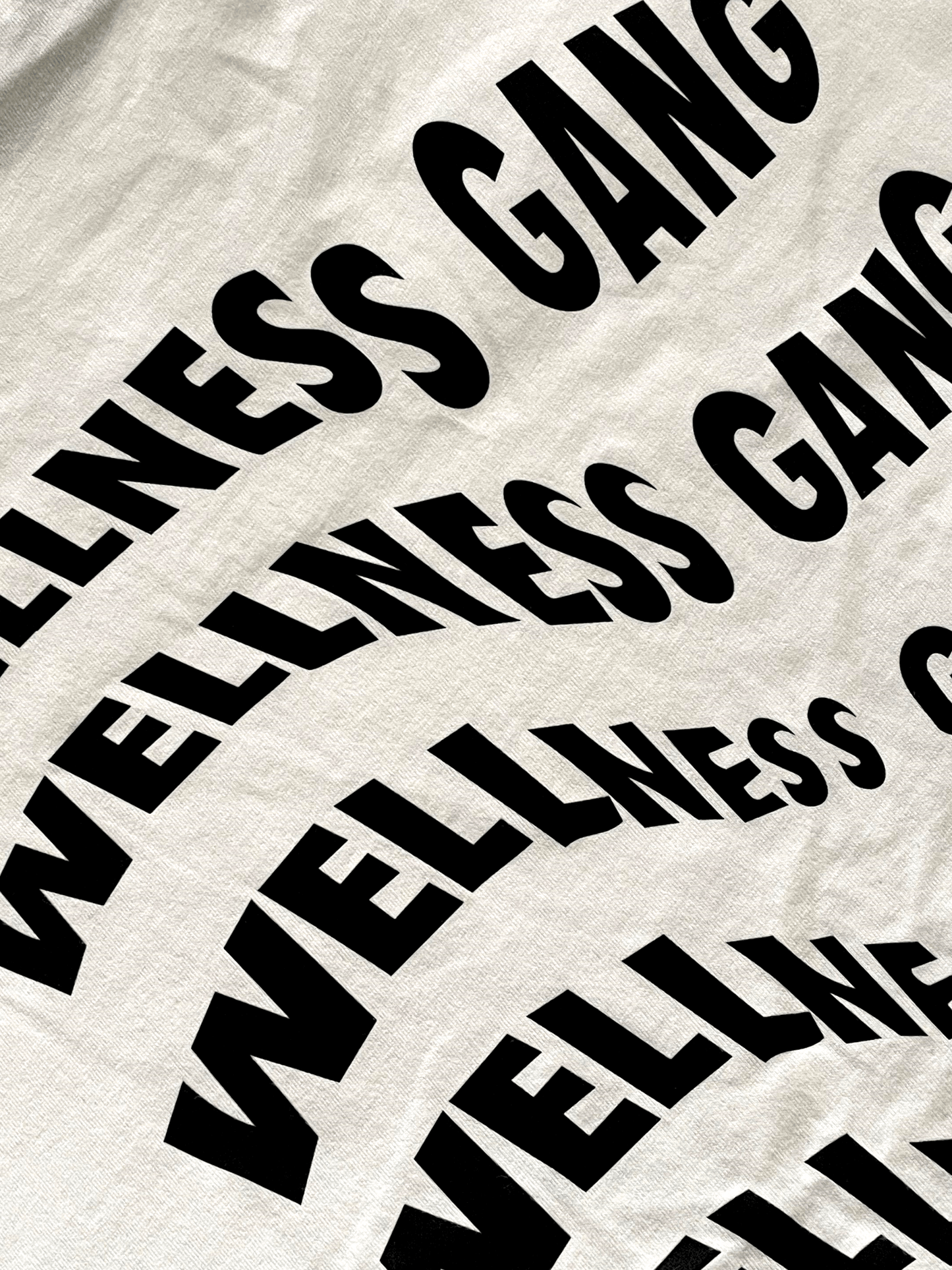 Men's Wellness Gang T-Shirt in 100% cotton with playful graphic design, perfect for casual comfort and style.