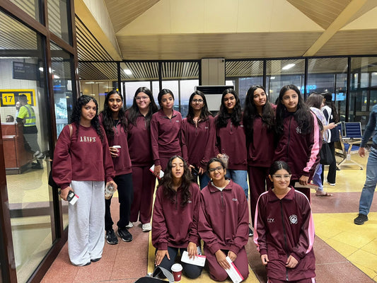 Ladies under 18 national swimming team in COZY burgundy Studio Terry quarter zip sets, Islamabad