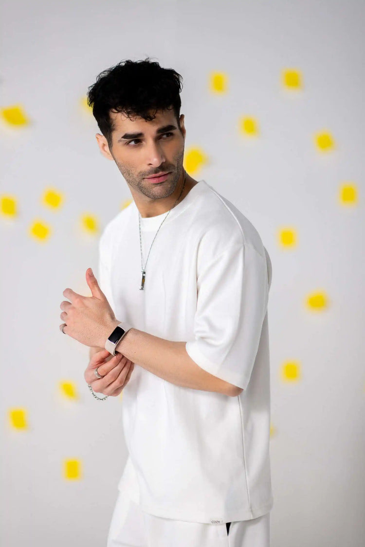 Men's summer collection: model in a Vanilla Latte White COZY oversized t-shirt