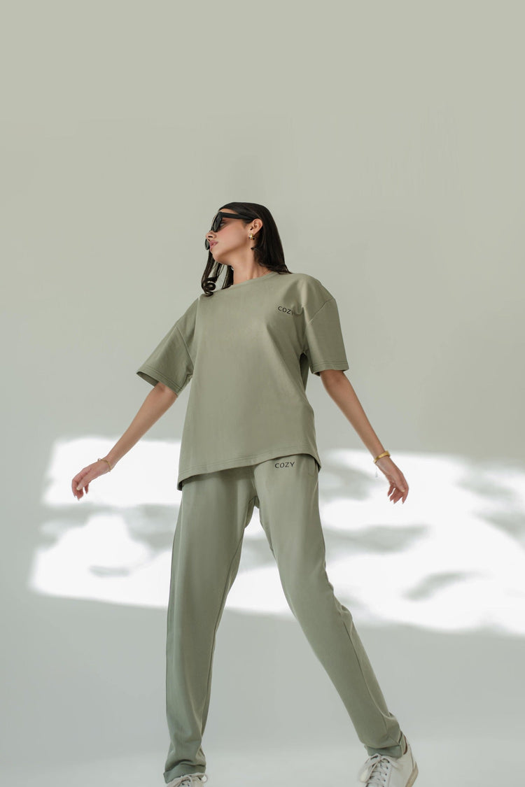 Matching set for women: model in a sage COZY Cotton tee and joggers co ord set