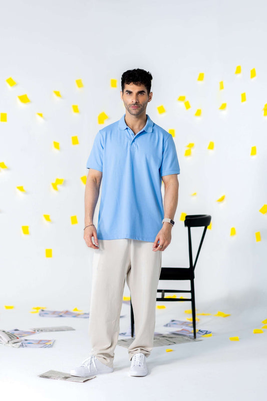 COZY Men's Classic Fit Pants paired with a blue polo in a vibrant photo shoot with sticky notes.