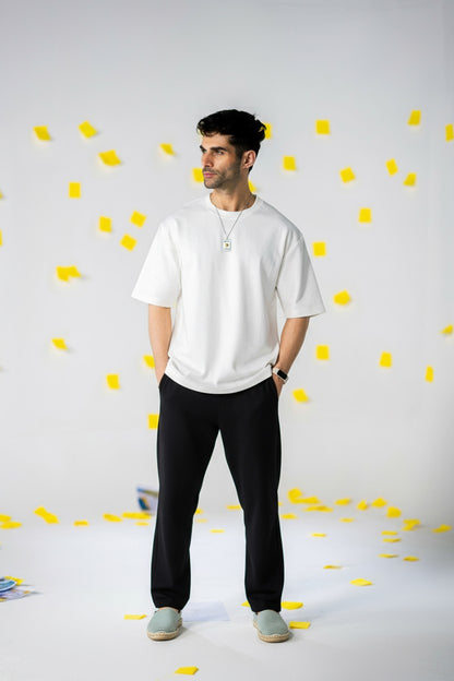 COZY Men's Classic Fit Pants worn by a model, showcasing soft breathable organic cotton and spandex blend design.