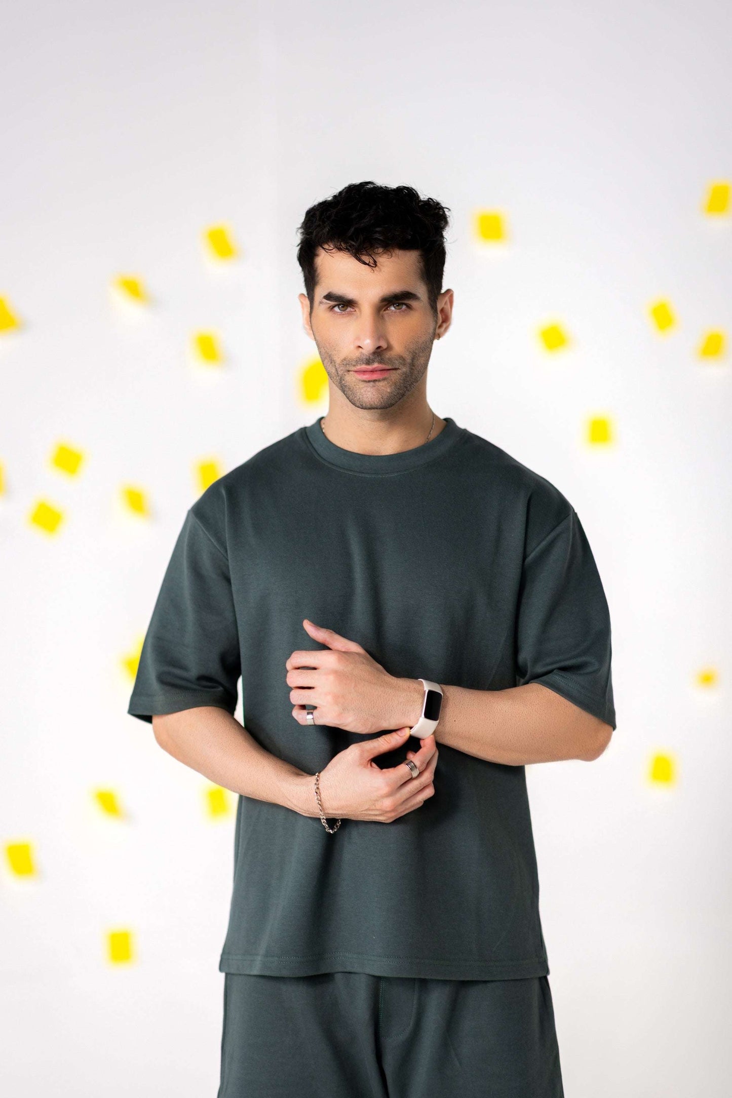Man wearing COZY Shorts V2 with relaxed fit and organic cotton, showcasing casual style and comfort.