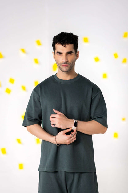 Man wearing COZY Shorts V2 with relaxed fit and organic cotton, showcasing casual style and comfort.