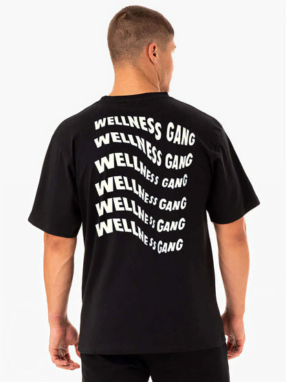 Men's Wellness Gang T-Shirt in black, showcasing playful graphic on back. 100% soft cotton for ultimate comfort.