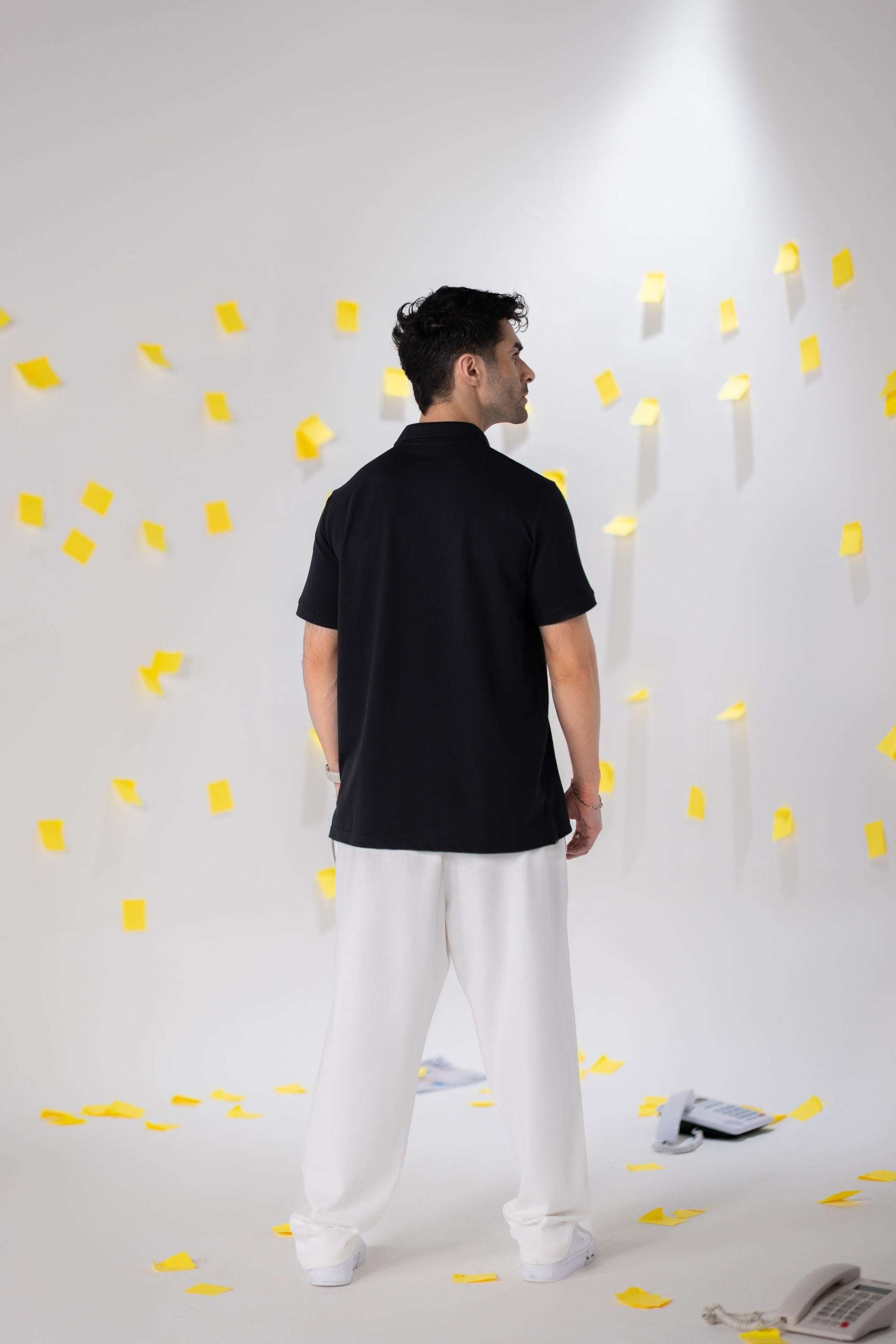 COZY Men's Classic Fit Pants showcasing a model from the back in a casual setting with soft breathable fabrics.