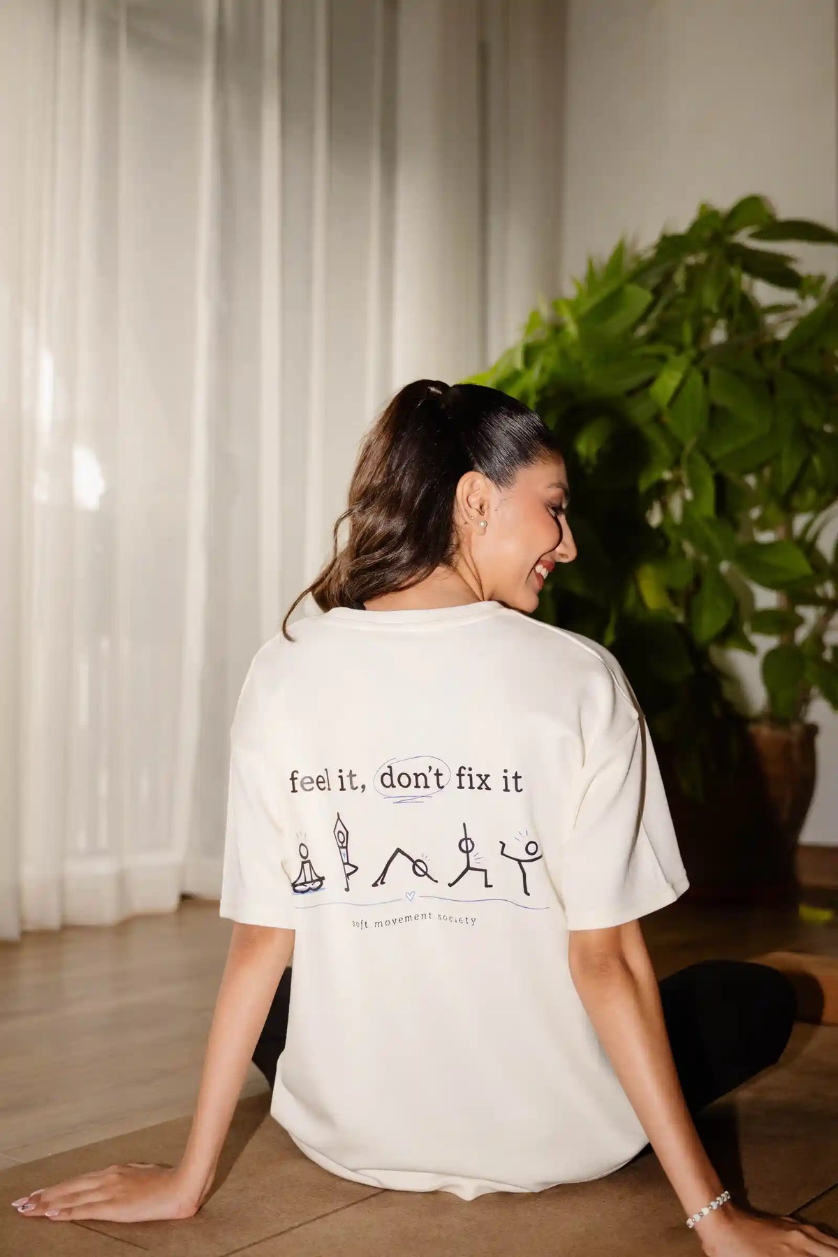 Feel It Don't Fix It oversized tee in cream COZY Cotton, back print detail view